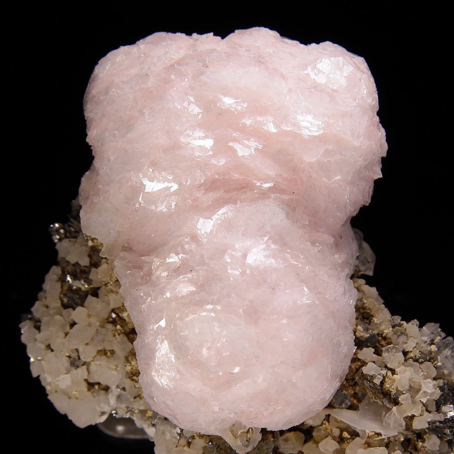 Calcite (var: Manganoan) with Calcite and Lollingite