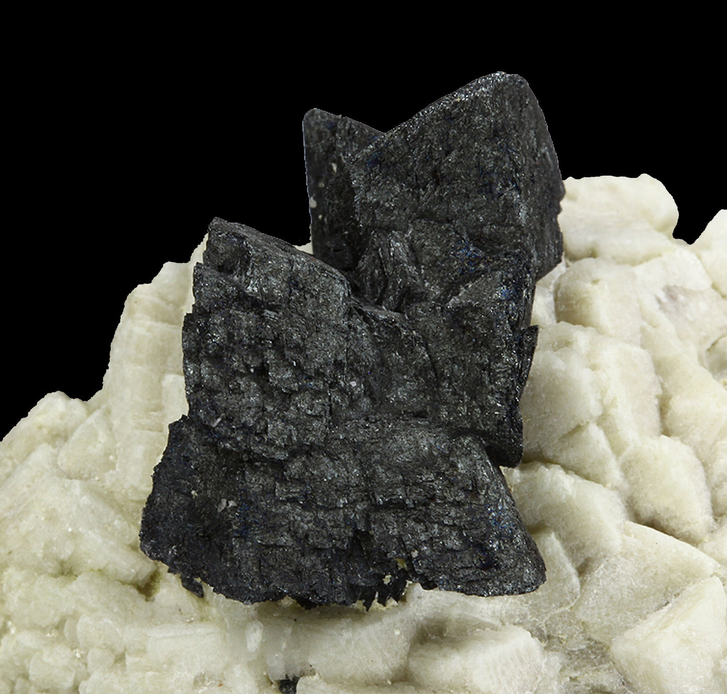Hematite pseudomorph after Siderite on Microcline with Fluorite