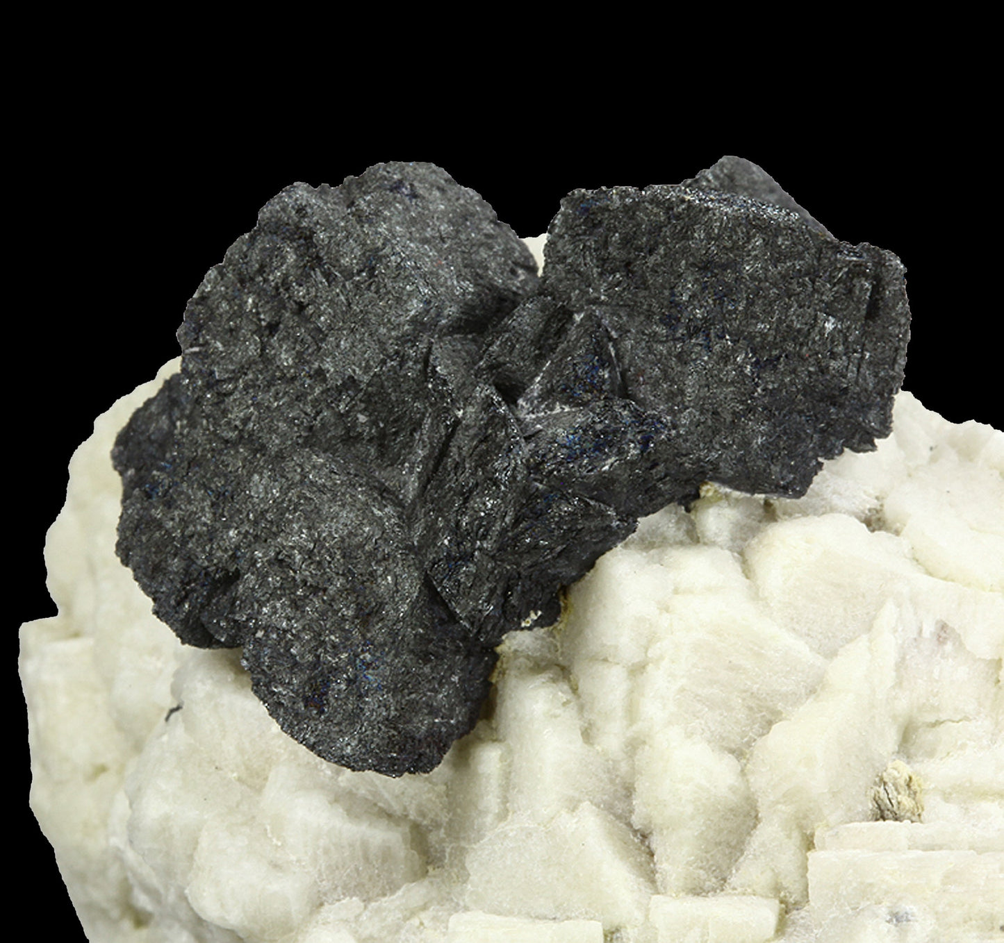 Hematite pseudomorph after Siderite on Microcline with Fluorite