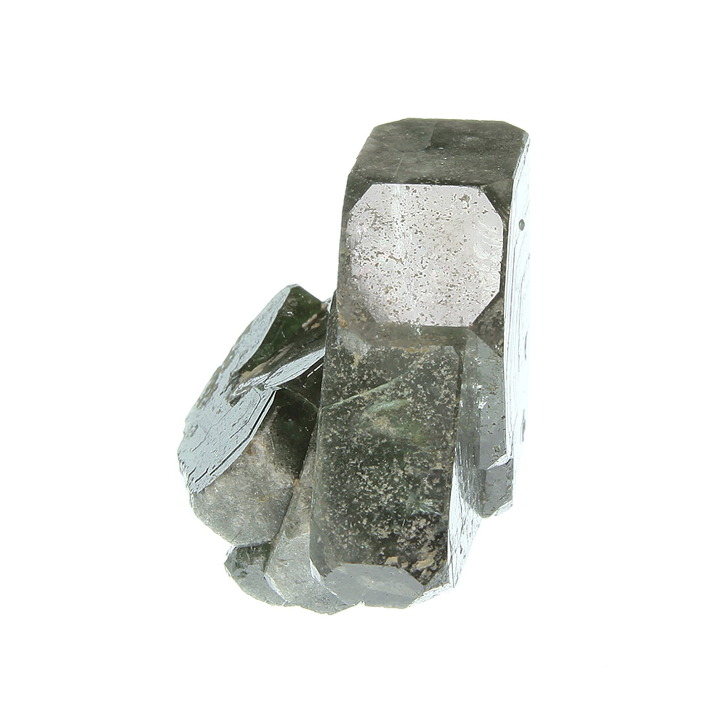 Fluorapatite with Actinolite (var: Byssolite) inclusions