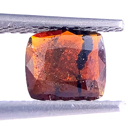 Brookite 
(INCREDIBLY rare, faceted stone)