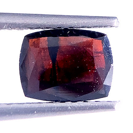 Brookite 
(INCREDIBLY rare, faceted stone)