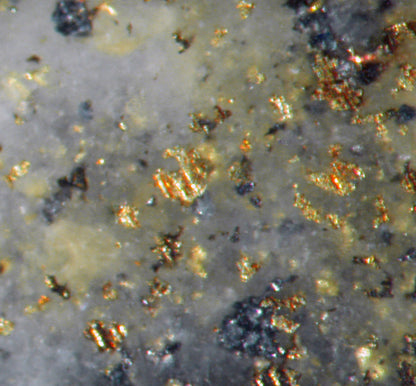 Gold with Pyroxmangite and sulfides plus Quartz