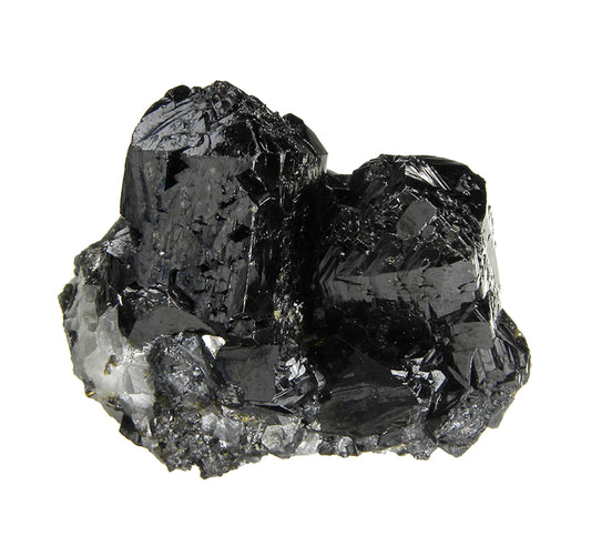 Cassiterite 
(“drill bit” twins)