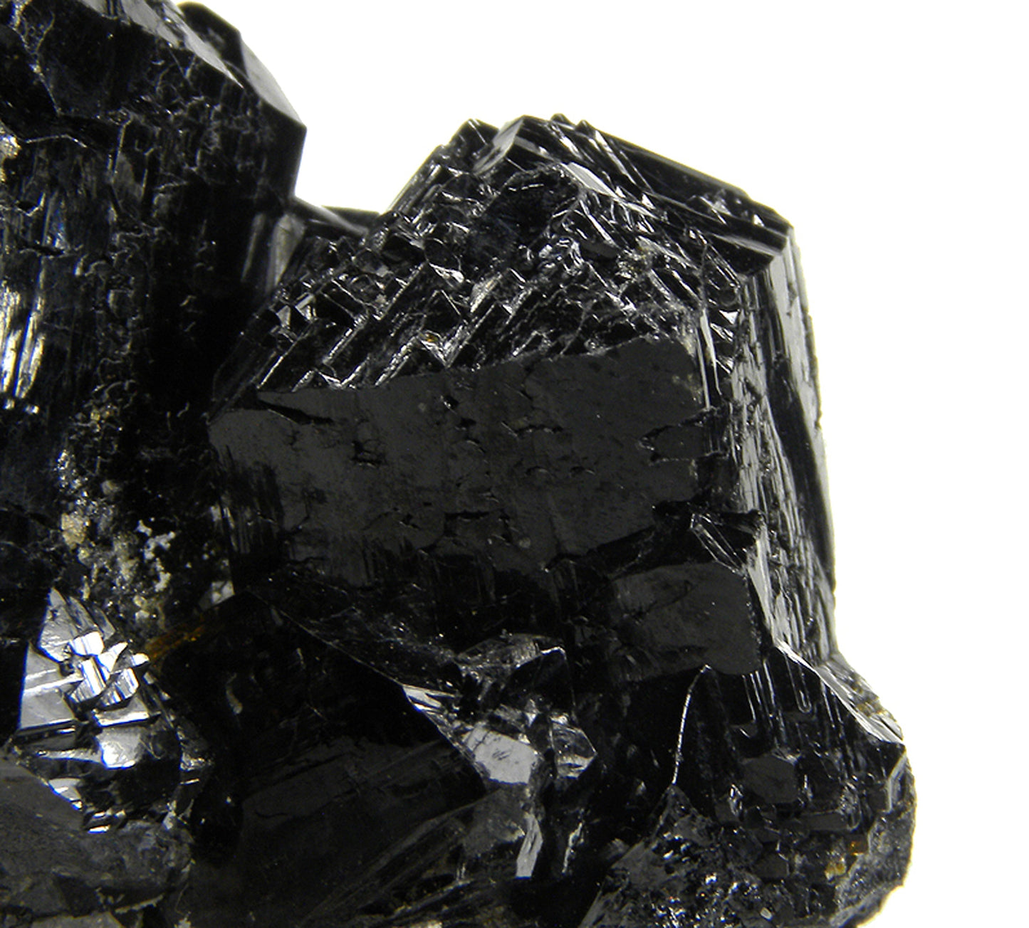 Cassiterite 
(“drill bit” twins)