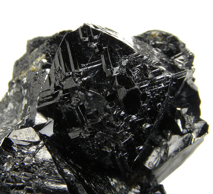 Cassiterite 
(“drill bit” twins)