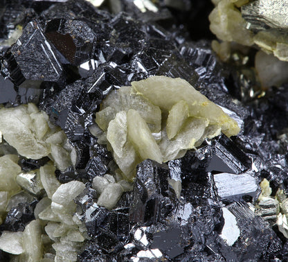 Pyrite “horseshoe” with Siderite on Sphalerite