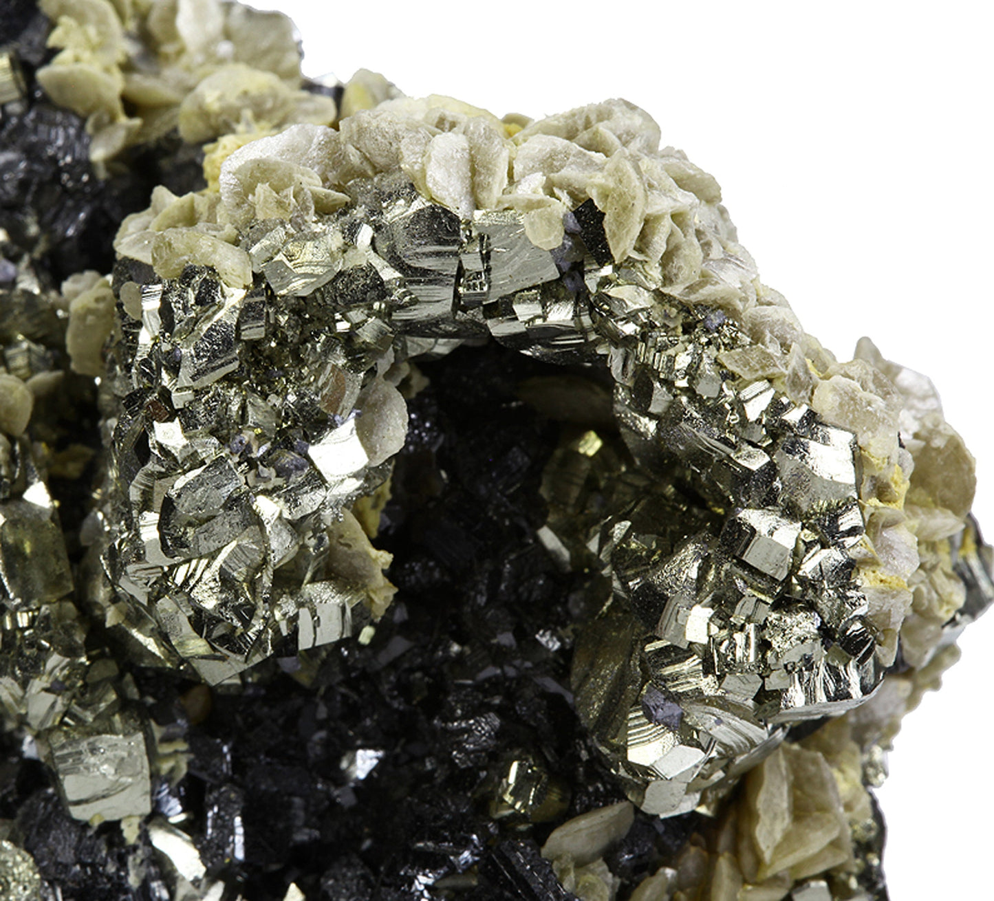Pyrite “horseshoe” with Siderite on Sphalerite