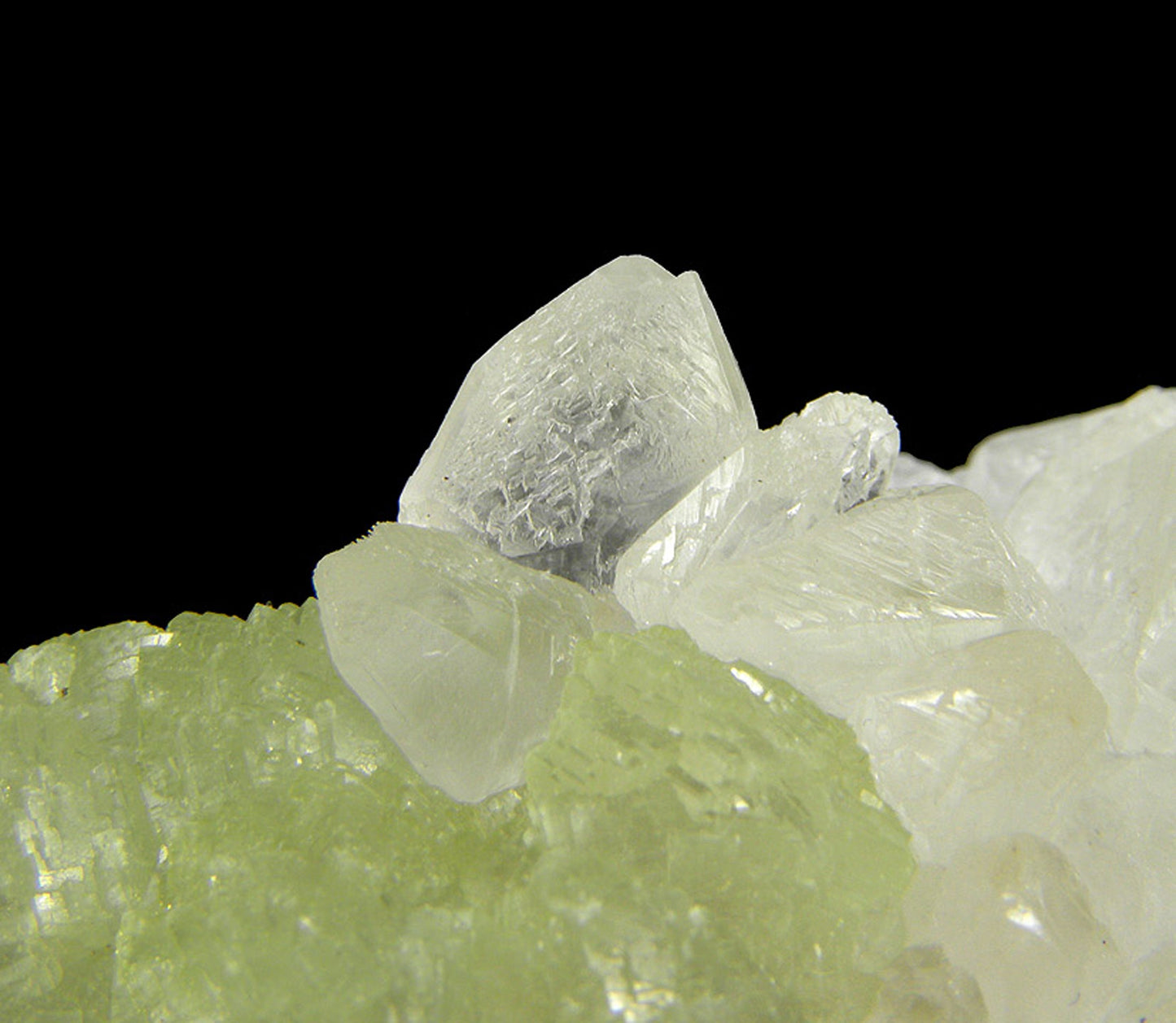 Prehnite casts after Anhydrite with Calcite