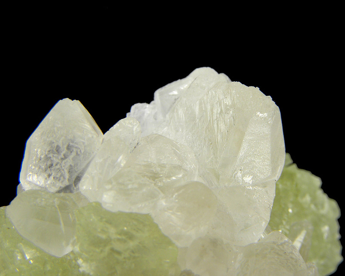 Prehnite casts after Anhydrite with Calcite